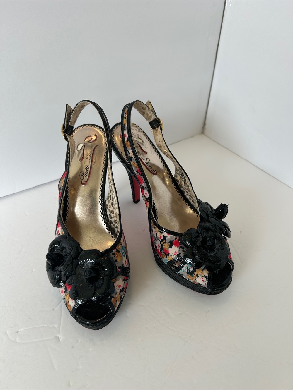 Poetic License Black Floral Peep-Toe Slingback Heels with Gold Insole